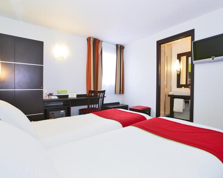 Enzo Hotels Reims Tinqueux by Kyriad Direct à partir de 55 €. Hôtels à  Tinqueux - KAYAK